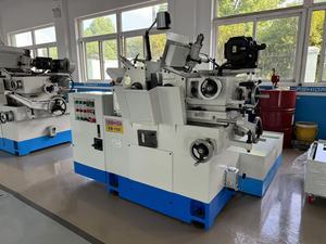 YASHIDA CG-12S <strong>CNC</strong> Centerless <strong>Cylindrical</strong> <strong>Grinding</strong> <strong>Machine</strong> <strong>Used</strong> with Motor and Engine Core Components for Surface <strong>Grinding</strong>