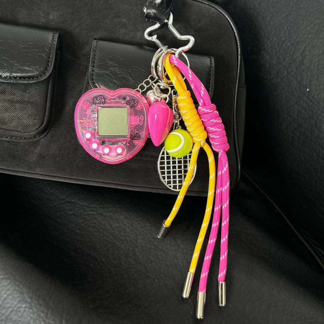 Machine à tennis pour animaux de compagnie rose, corde rose et jaune (boucle en forme d'os)