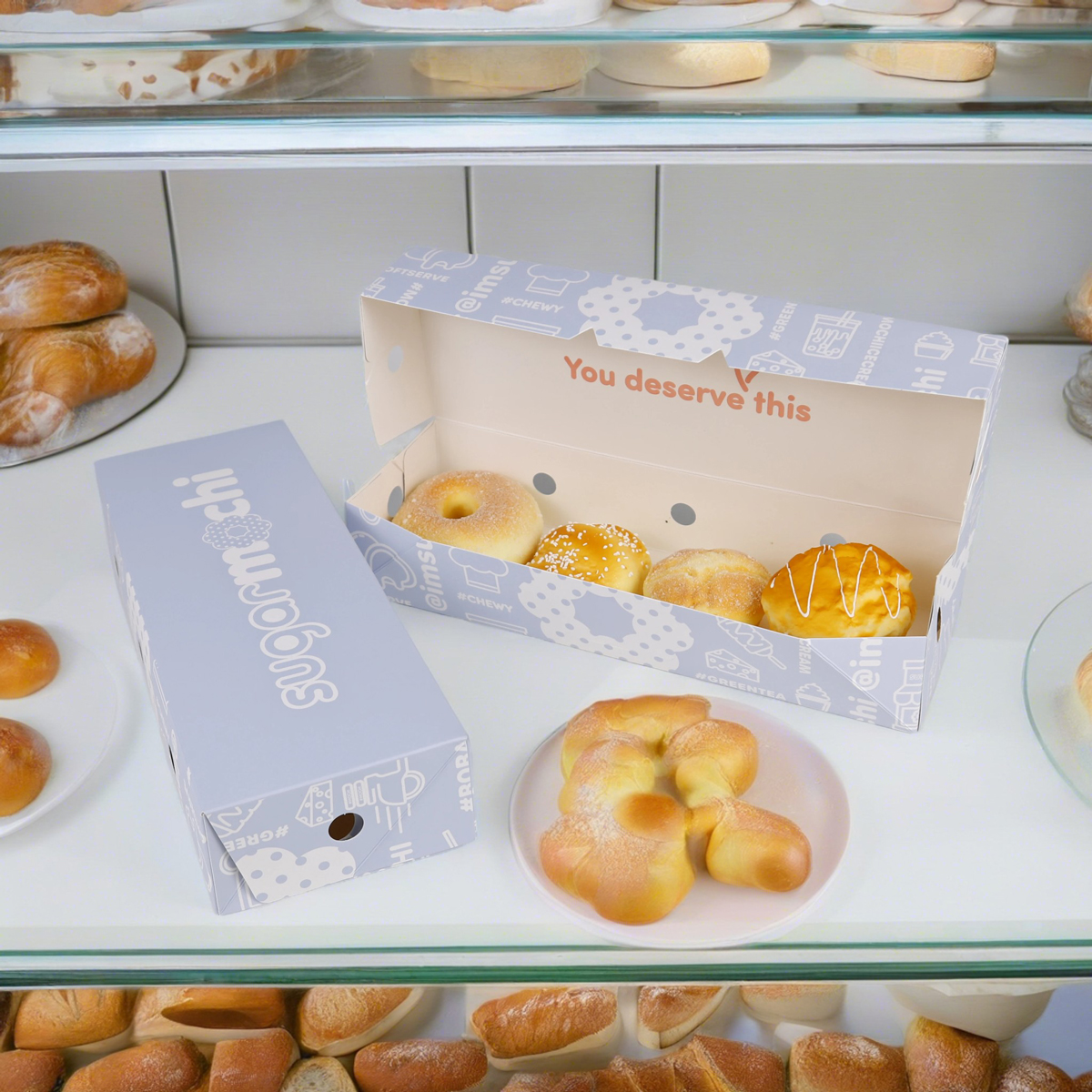 cuatro cajas de pastel