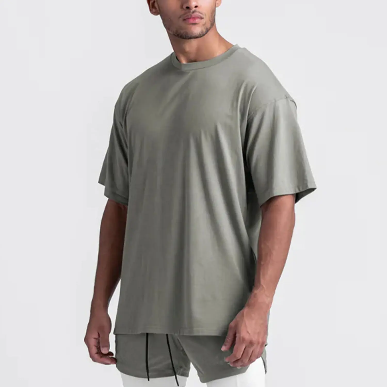 Verano suelto sólido algodón deportes hombres manga corta Split Bottom Fitness Camiseta cuello redondo secado rápido camisetas