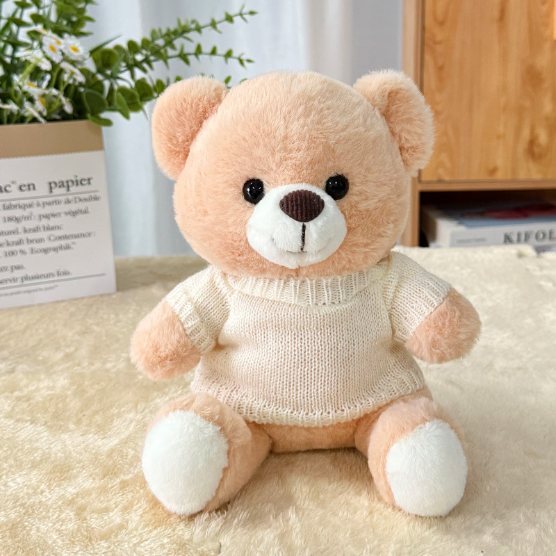 Maglione beige con orsetto di peluche