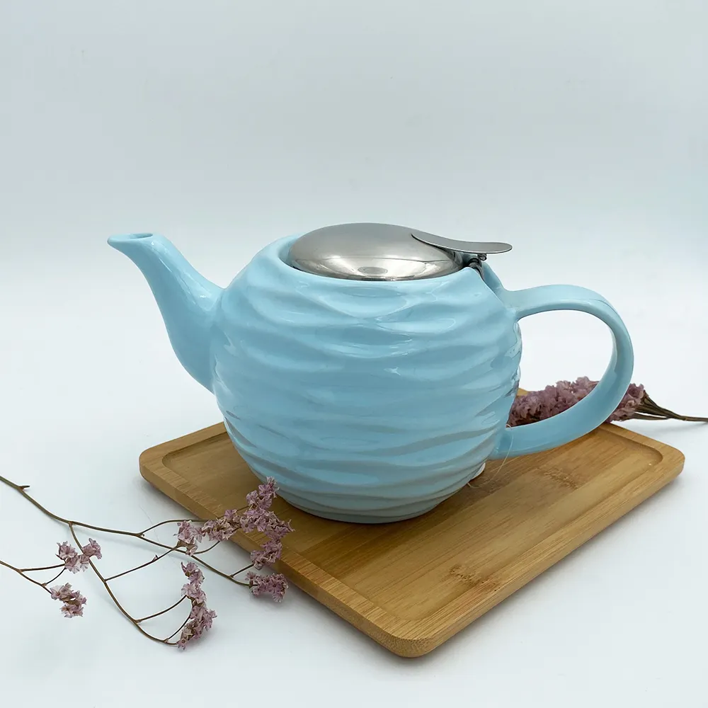 नए उत्पाद विचार 2024 सिरेमिक चाय की केतली एकल चायदानी चीनी मिट्टी के बरतन चाय सेट फिल्टर के साथ बिक्री के लिए