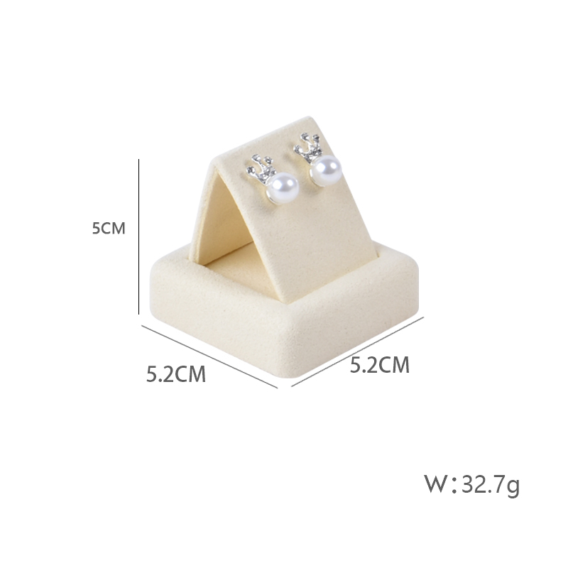 support de boucle d'oreille beige