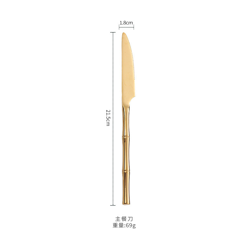 Cuchillo de mesa dorado
