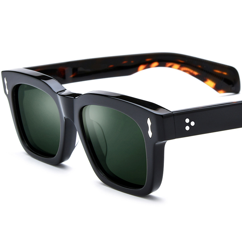 Montura colorida de carey negro, verde oscuro.