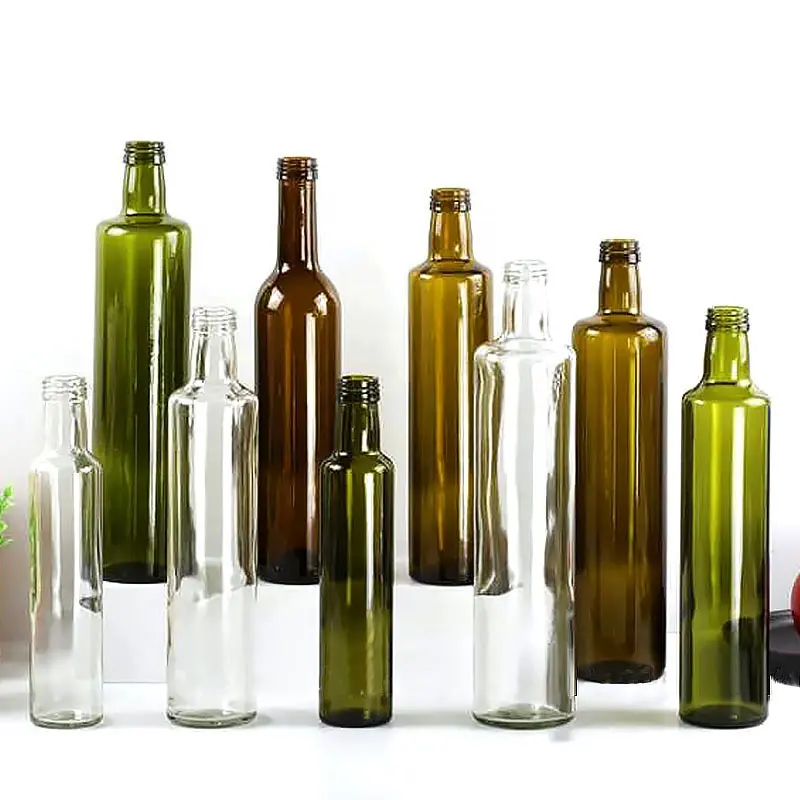 Bottiglie di vetro di olio d'oliva da cucina all'ingrosso 100ml 250ml 500ml bottiglie di salsa di aceto rotonde trasparenti vuote con tappi in metallo