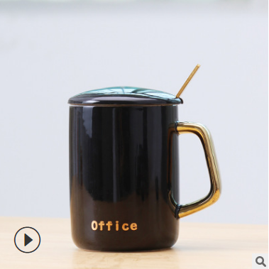 black mug lid spoon