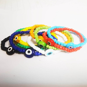 โรงงาน OEM ที่กําหนดเองสีและความยาวขายส่งเคลือบตาลูกปัดเด็กและเด็กผู้หญิงรอบที่มีสีสันแก้วเมล็ดลูกปัดสร้อยข้อมือเครื่องประดับ - Product Image 5