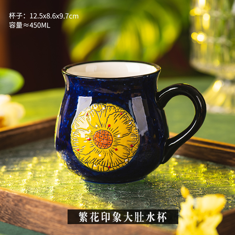 Taza grande del vientre de la impresión azul de la flor