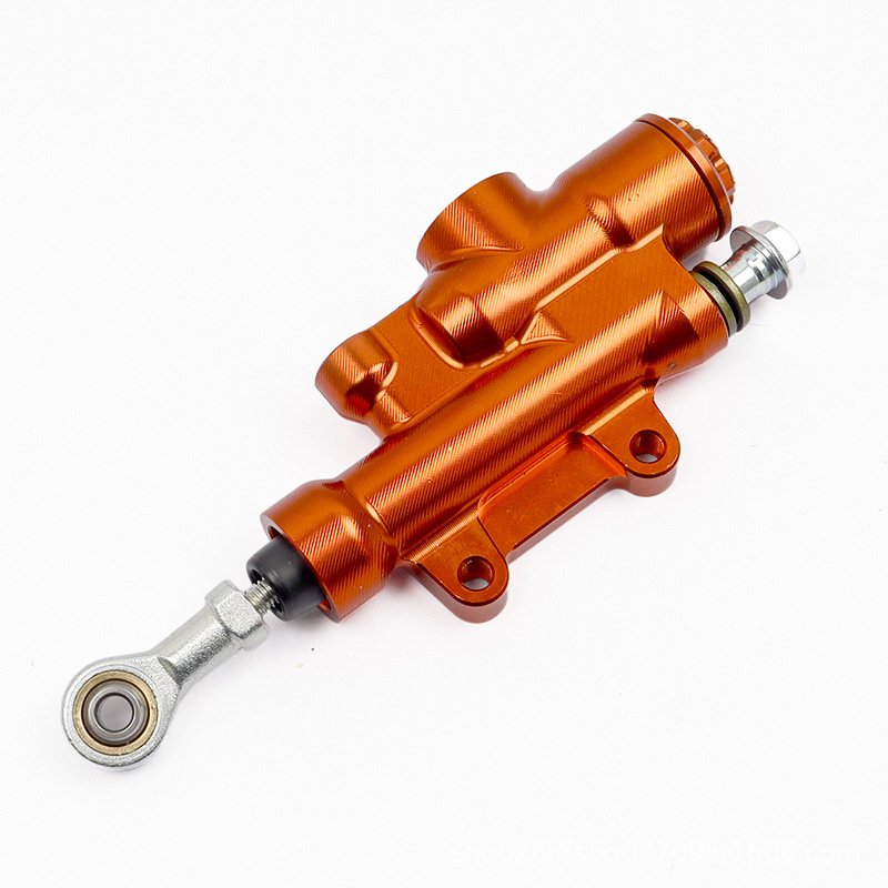 Bomba de freno trasero CNC naranja.