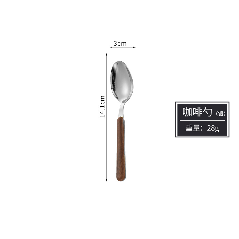 Cuillère à café en argent et bois de noyer