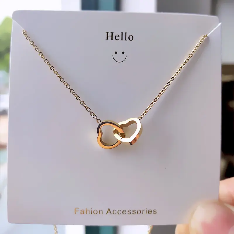 Collana a doppio cuore in acciaio inossidabile 316L lucido per ragazze regalo di san valentino collana a cuore Interlock in acciaio al titanio