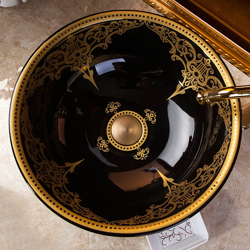 Ronda de Jingdezhen porcelana sanitaria pintado a mano arte negro con patrón oro de cerámica lavabo en el cuarto de baño