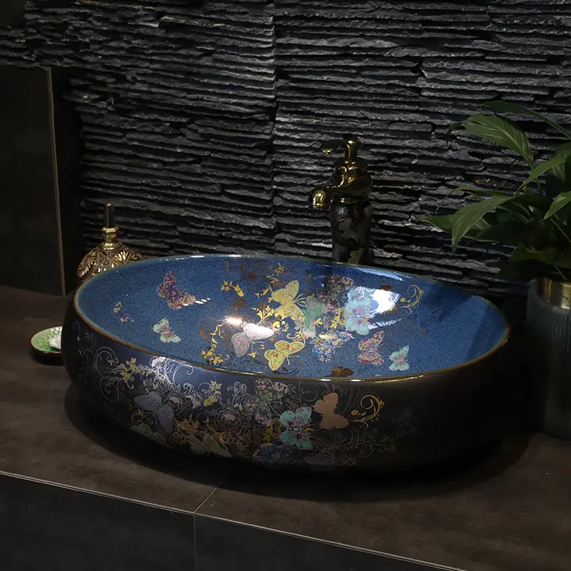 Cinese a mano di fatta di ceramica lavabo in porcellana bacino di forma ovale nero con il blu satinato modello di farfalla lavandino del bagno