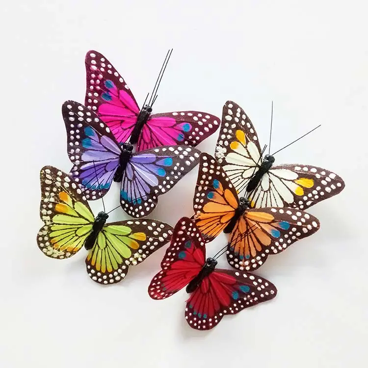 Mariposa Monarca pintada a mano de colores surtidos para decoraciones de boda