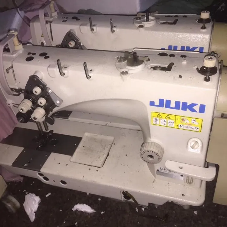 JUKIs LH-3528A máquina de coser de punto de bloqueo de doble aguja, usada