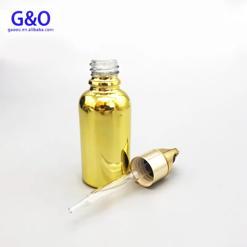 Hot 30ml Essential oil perfume essences cheap measurements on the pipette Gold glass bottle with Basket gold silver dropper cap