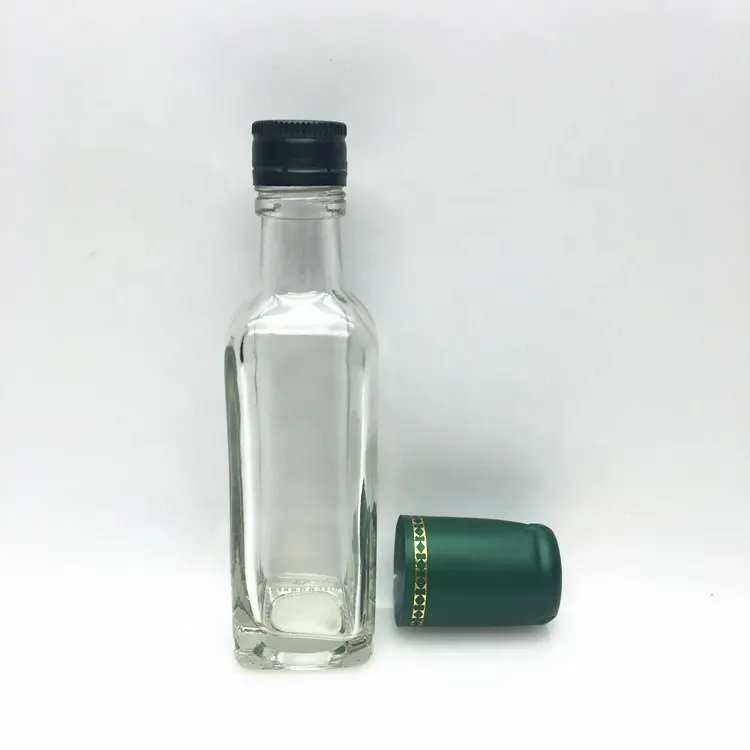 Confezione Mini bottiglia di olio d'oliva in vetro quadrato trasparente da 100ml