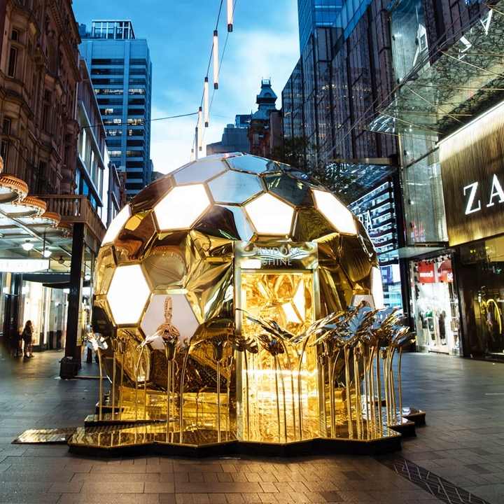 Padoa Shopping Mall Window Display Shiny Gold Tulip Flower Leaves Metal Art Sculpture