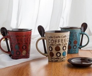 the glazed pottery ceramic mug with spoon for milk <strong>coffee</strong> <strong>and</strong> juice