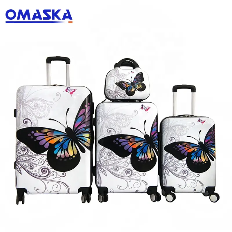 Hecho en China fábrica 4 piezas 20 24 28 pulgadas mariposa abs maleta con 12 estuche de maquillaje