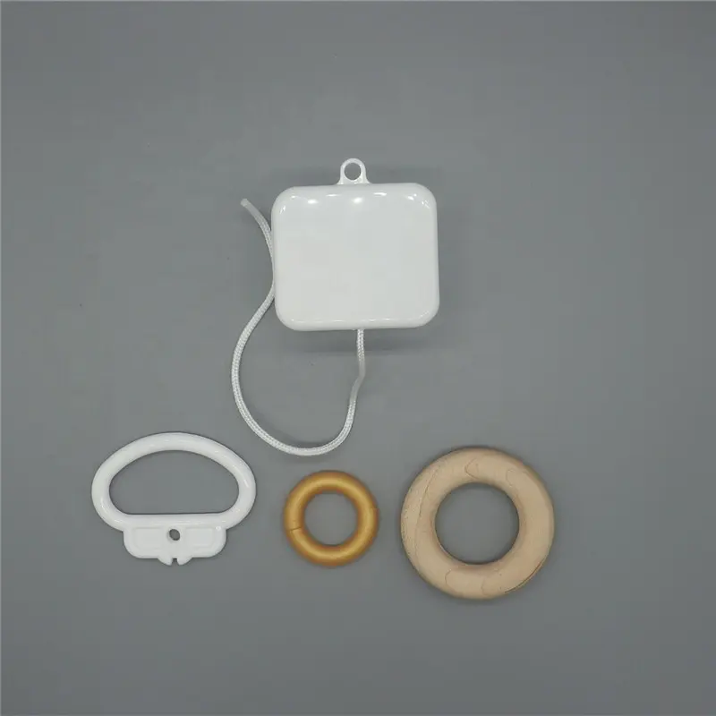 Caja de música de cuerda de tracción con forma redonda para juguetes de peluche