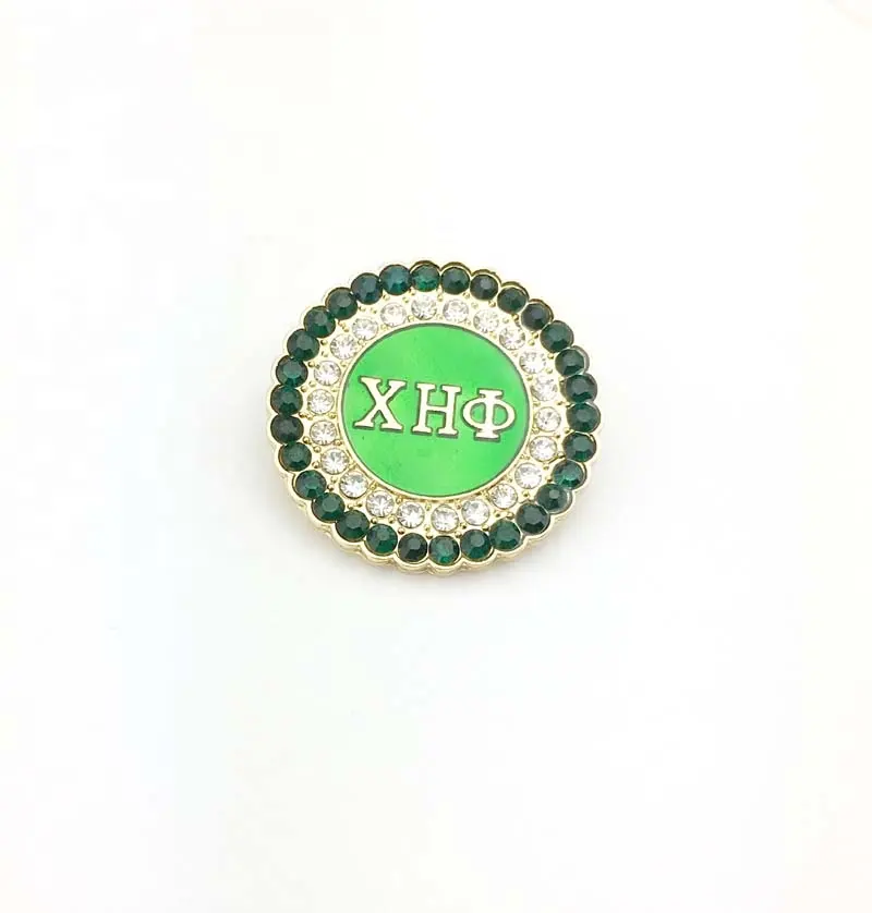 Xho chi eta broche verde redondo com strass, produtos da sororidade e da frernidade