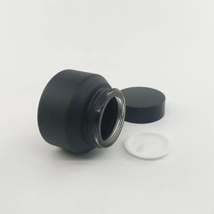 Unique matte black 30g glass jar with lid for cosmetic face cream skin care serum packaging at a reasonable wholesale price