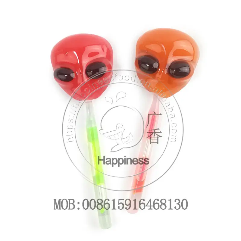 High quality fluorescent lollipop fruit flavored Alien face hard candy