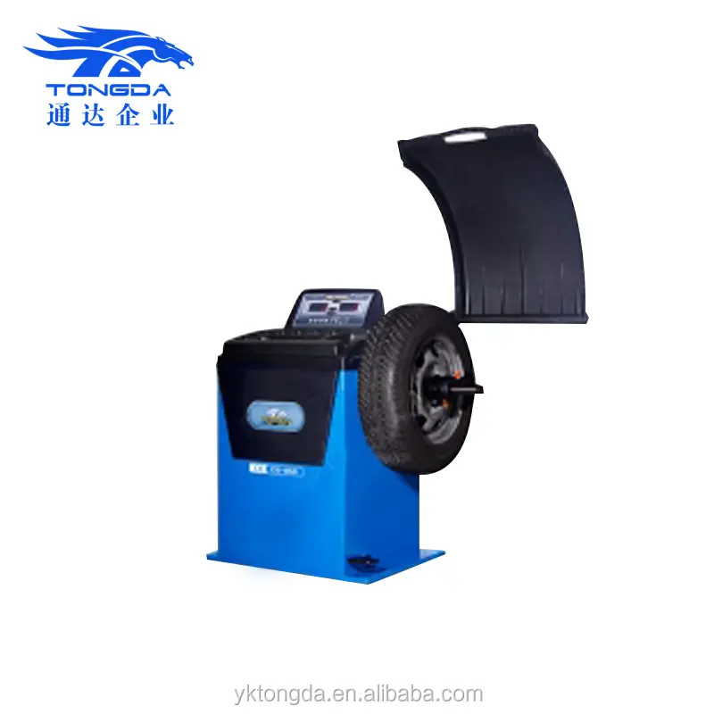 2017 China barato CE balanceador de la rueda de lanzamiento precio Tongda de calidad superior rueda máquina de equilibrio cb 580 para la venta