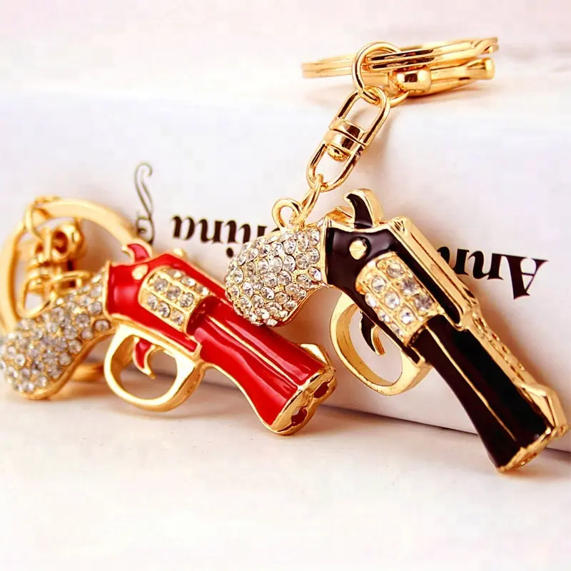 De moda en miniatura Revolver pistola arma modelo de moda llavero clave anillos Mini pistola clave cadena para hombres joyería de las mujeres regalo sorpresa