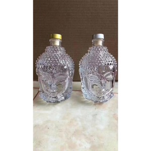 En iyi satmak 750ml temizle cam şarap şişesi buda kafa tasarımı ile buda kafa likör şişe temizle cam ahşap mantar toplu satış