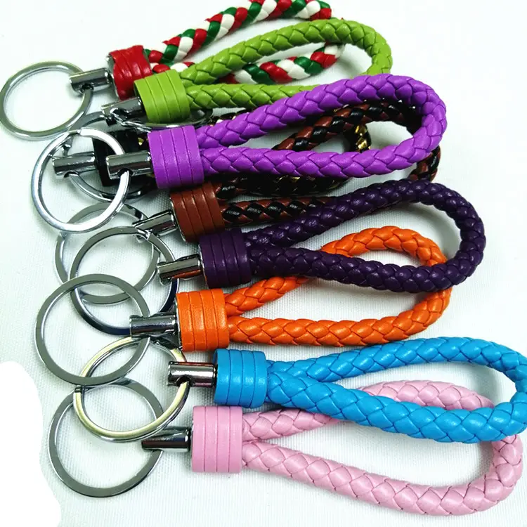 Colorfulbraid catena chiave di cuoio & Pompon catena chiave di cuoio manifattura in Dongguan