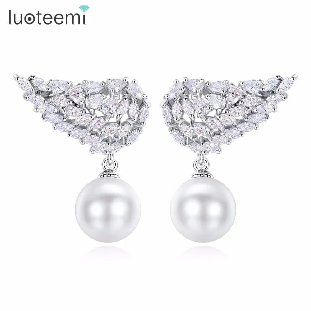 LUOTEEMI-pendientes de doble pluma para mujer, aretes pequeños, plata esterlina 925, Perla de imitación transparente, estilo elegante, chica, fiesta