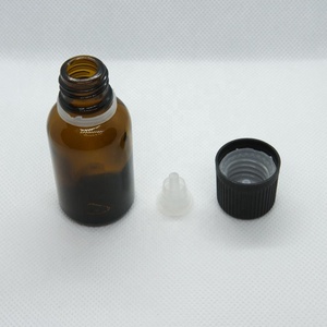 琥珀色玻璃圆瓶，带短滴管防盗盖，用于精油盖