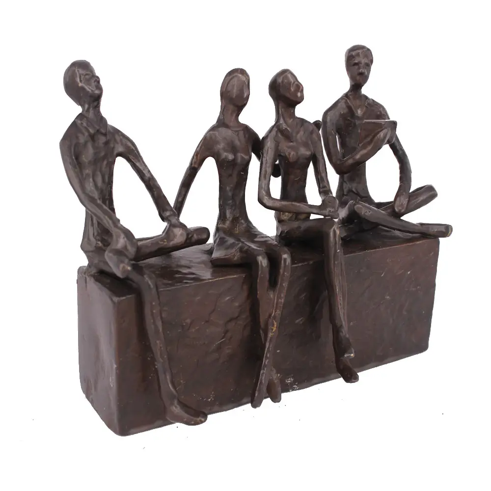 brass sculpture of friends sit on a chair to spend time at leisure