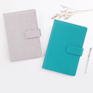 Cuaderno A5 de nuevo diseño de moda 2024 con cubierta de tela, costura de sillín, encuadernación, páginas forradas, bolsillo para diario y portalápices - Product Image 1