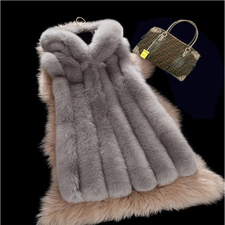 Ponchos d'hiver en fourrure de vison pour femmes/Veste en fourrure de vison/Manteau en fourrure de vison tricoté Vêtements pour femmes