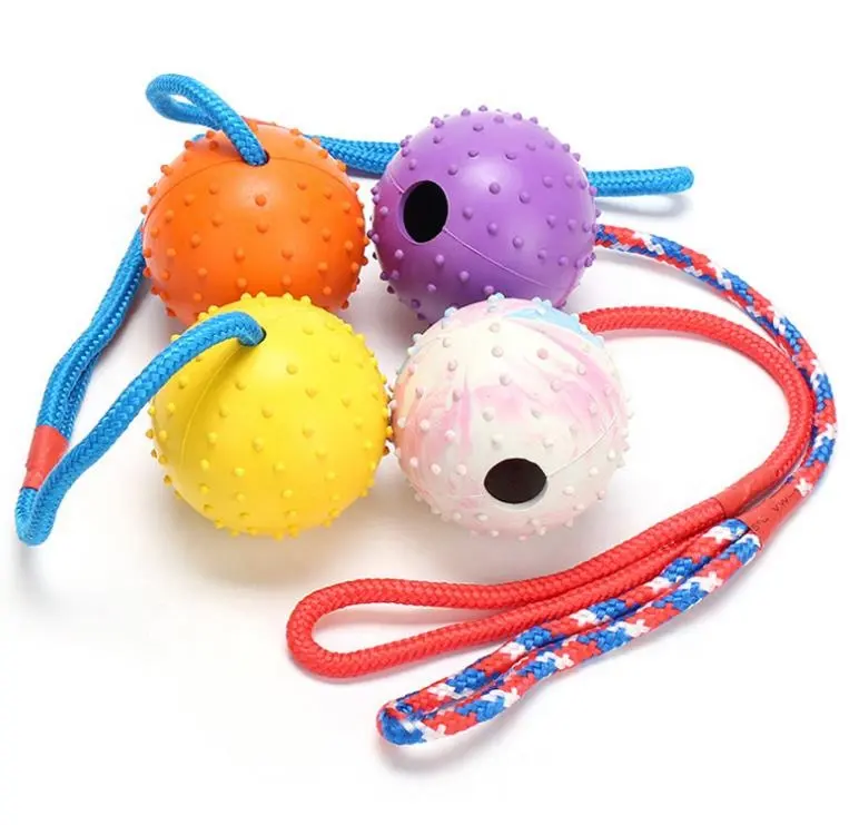 Wholesale pet dog nutal rubber ball with string, pet dog chew toys balls with rope.