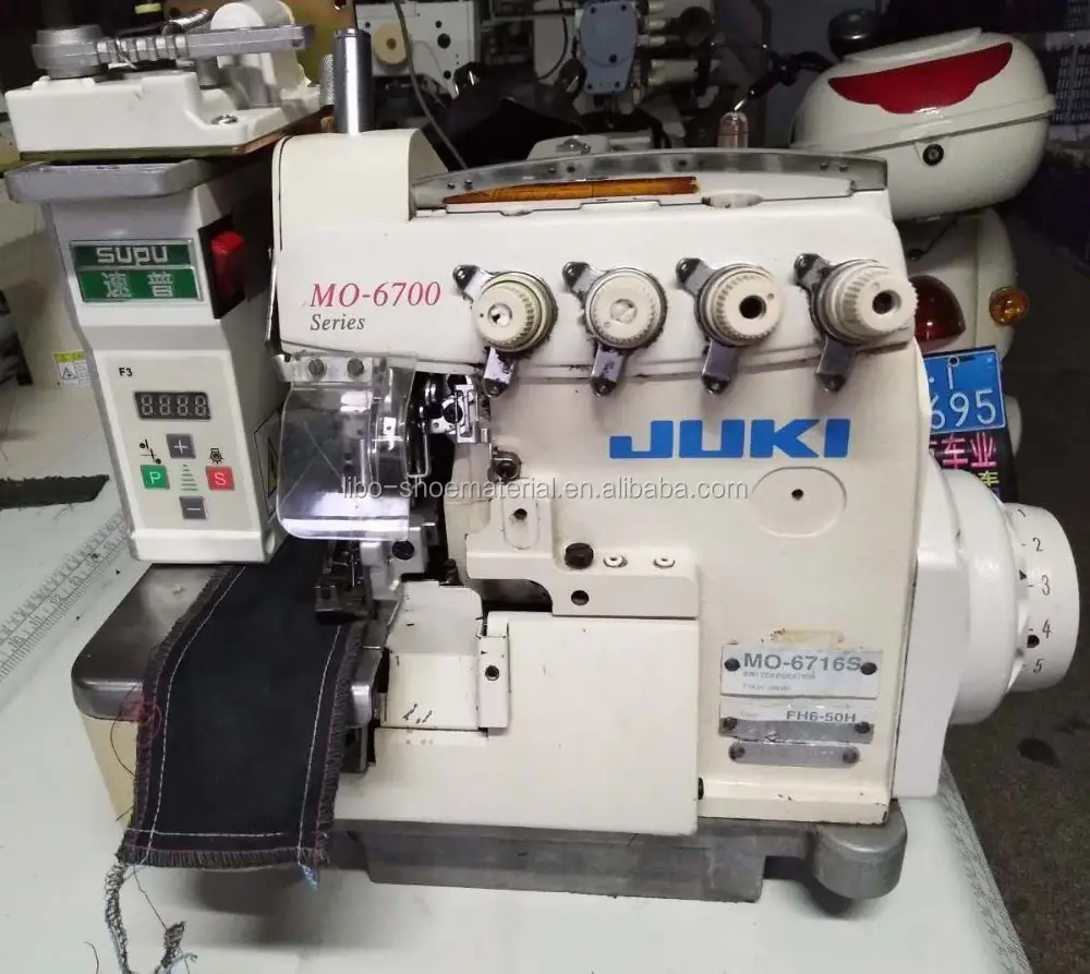 Japon machine MO 6714S/6716 4 fils haute vitesse industrielle utilisé surjeteuse machine à coudre