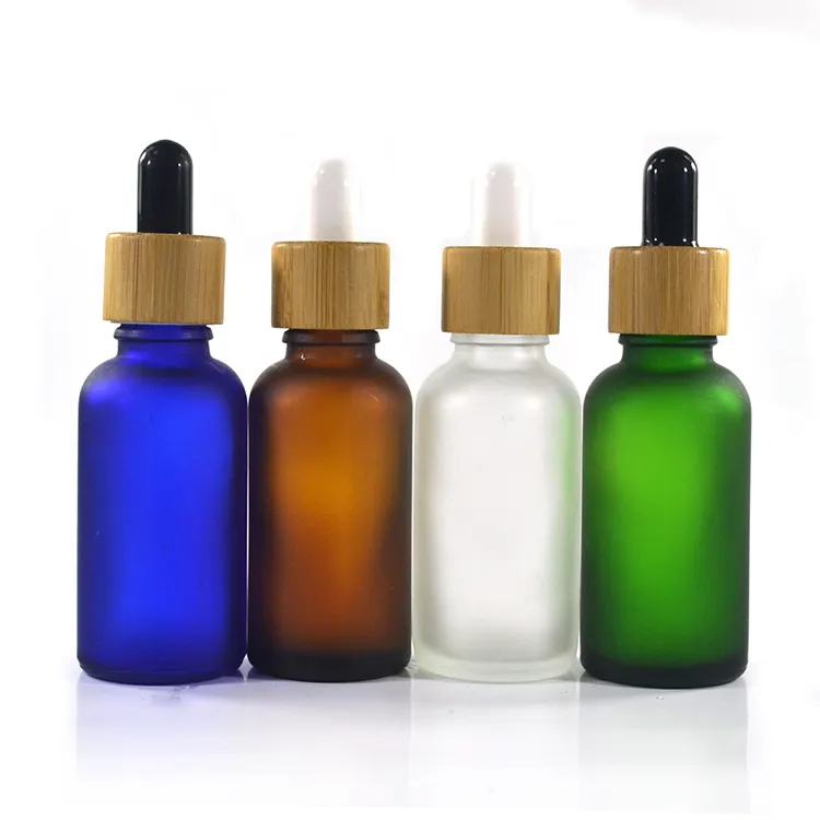 5ml 10ml 15ml 20ml 30ml 50ml 100ml frosted green blue amber clear essential oil glass dropper bottle with bamboo lid