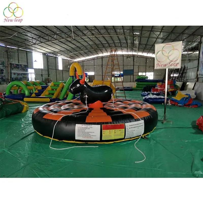 popular small inflatable bungee bull rodeo inflatable manual bull riding game for kids