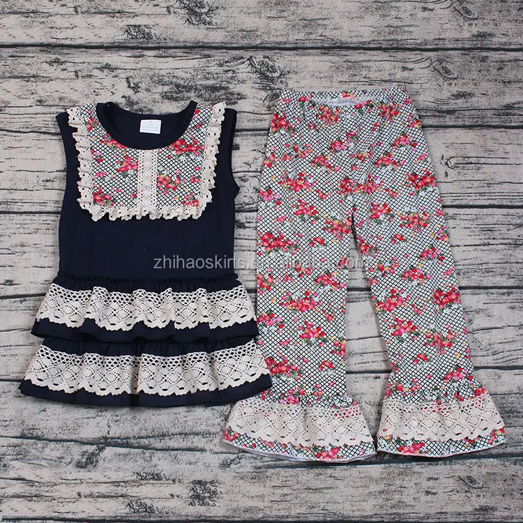 Zhihao verano flor niñas 2 unids boutique trajes ropa niños al por mayor ruffle Top pantalones partido ropa tienda online