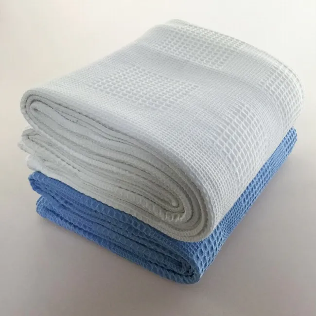 S4218 Venta caliente de punto de ganchillo celular waffle mantas liso colores 100 térmica de algodón hospital mantas