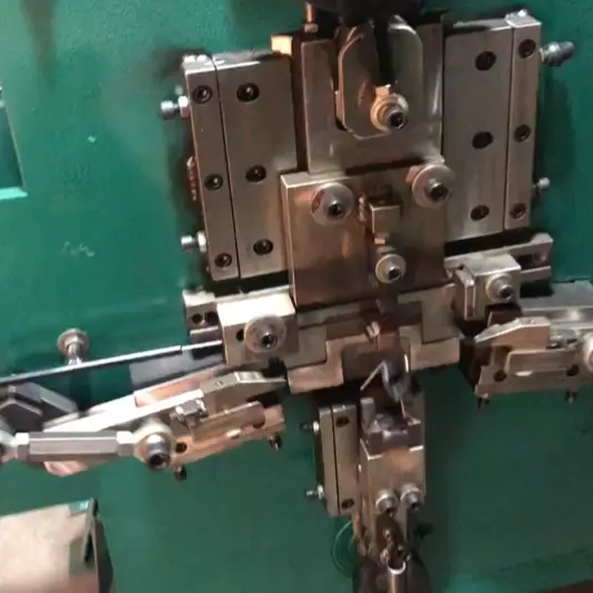 Composite cord strapping buckle making machine for 1/2"