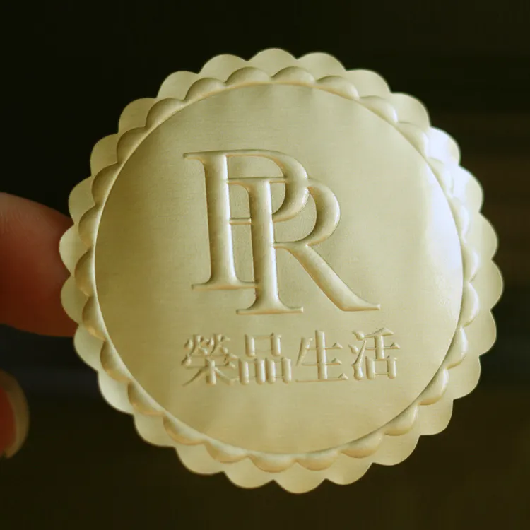 Etiqueta adhesiva de papel de aluminio dorado 3D en relieve con logotipo de nombre personalizado de alta calidad, bajo pedido mínimo, con lámina dorada