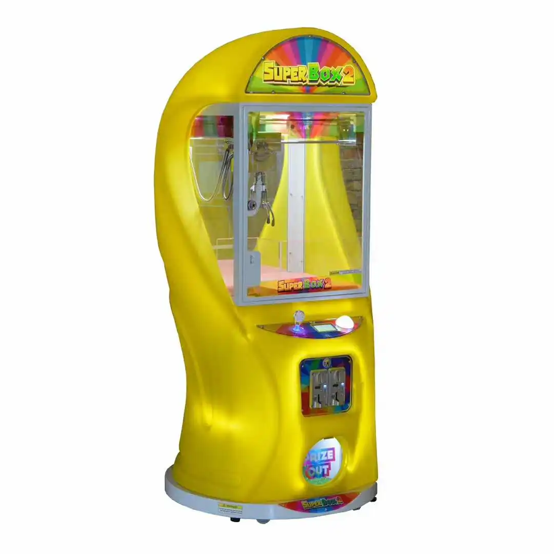 Machine de presse de penny de jouet de cadeaux de grue de vente chaude