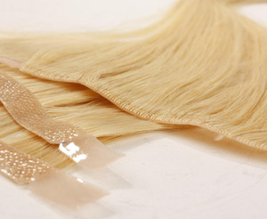 高品質のナチュラルで着用しやすい肌の横糸ヘアエクステンション
