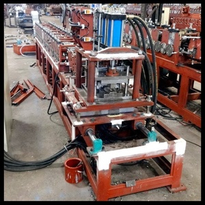 Sử dụng tự động cuộn tạo thành máy cho thép mạ kẽm Con lăn màn trập cửa gạch hình thành động cơ máy động cơ mang động cơ để bán - Product Image 5