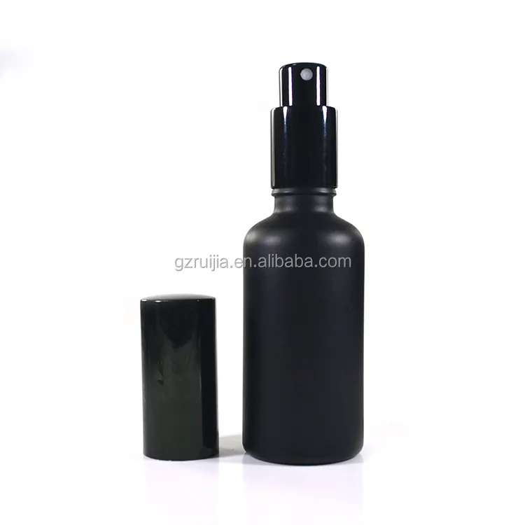 Bouteille en verre noir givré de parfum d'huile essentielle de bouteille noire mate